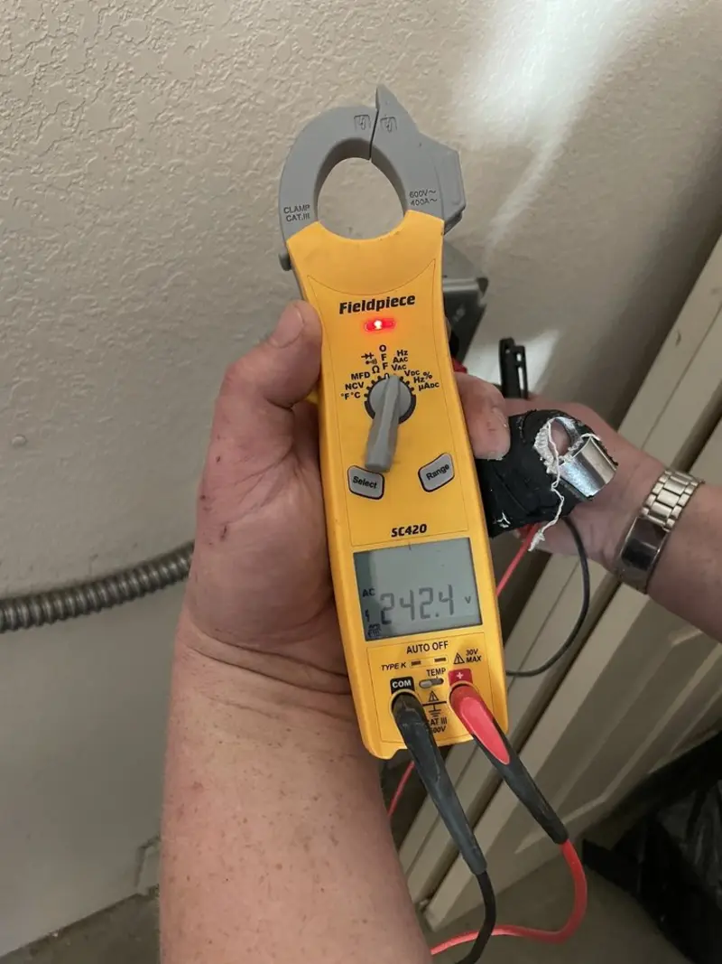 Voltage testing with clamp meter during Electrical Installation Services in Petaluma